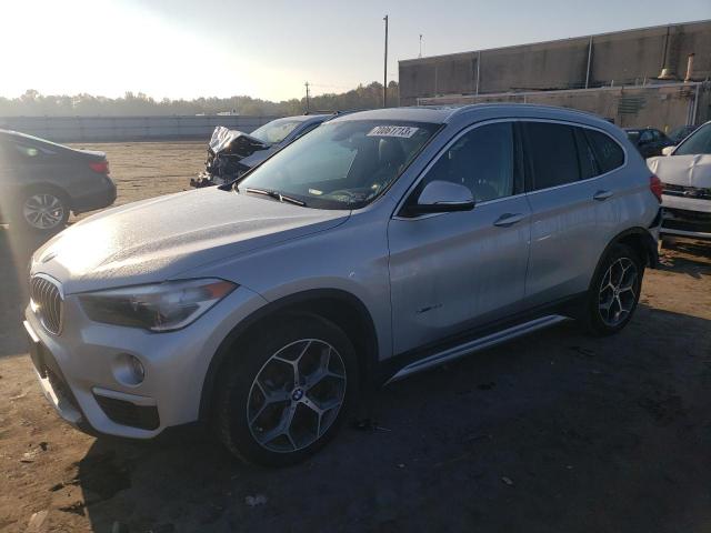 BMW X1 2018 with VIN WBXHT3C3XJ5K22778 - Photo from auction