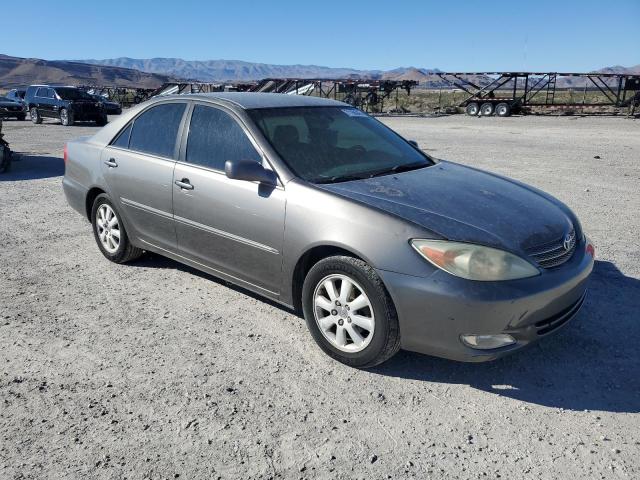 Photo 4 from auction – 2004 TOYOTA CAMRY LE with VIN 4T1BE30K54U846423