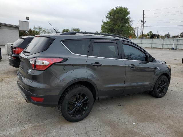 Photo 3 from auction – 2018 FORD ESCAPE SE with VIN 1FMCU9GD9JUD02293