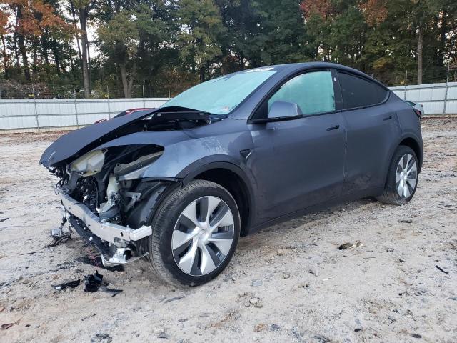 TESLA MODEL Y 2023 with VIN 7SAYGDEE1PA161897 - Photo from auction