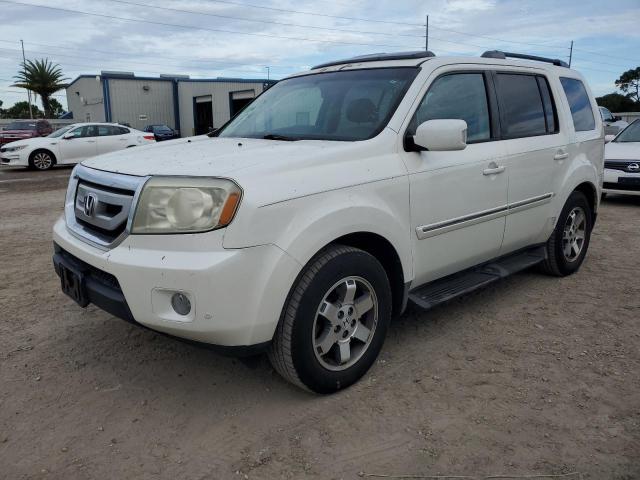 HONDA PILOT TOUR 2011 with VIN 5FNYF3H99BB024811 - Photo from auction