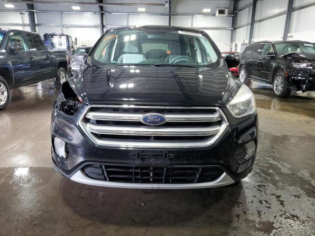 Photo 5 from auction – 2017 FORD ESCAPE SE with VIN 1FMCU9GD0HUD90340