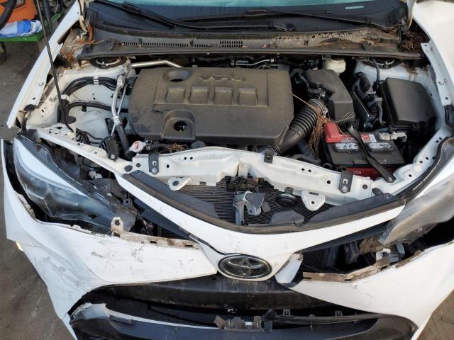 Photo 11 from auction – 2018 TOYOTA COROLLA L with VIN 2T1BURHE6JC968435