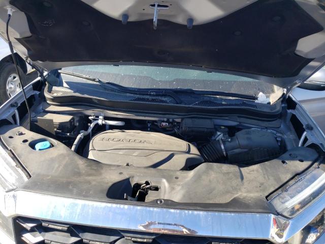 Photo 11 from auction – 2022 HONDA PASSPORT E with VIN 5FNYF8H5XNB006235