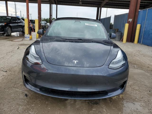 Photo 5 from auction – 2021 TESLA MODEL 3 with VIN 5YJ3E1EA2MF047561