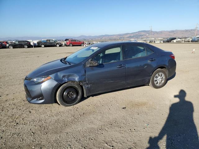 TOYOTA COROLLA L 2018 with VIN 5YFBURHE5JP782644 - Photo from auction
