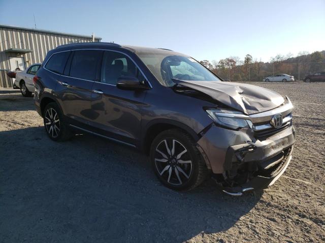 Photo 4 from auction – 2021 HONDA PILOT TOUR with VIN 5FNYF6H66MB030902