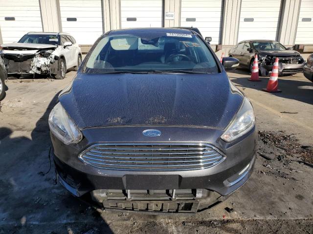 Photo 5 from auction – 2016 FORD FOCUS TITA with VIN 1FADP3J27GL228414