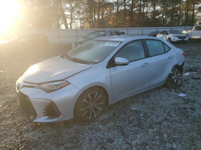TOYOTA COROLLA L 2017 with VIN 5YFBURHE4HP587273 - Photo from auction