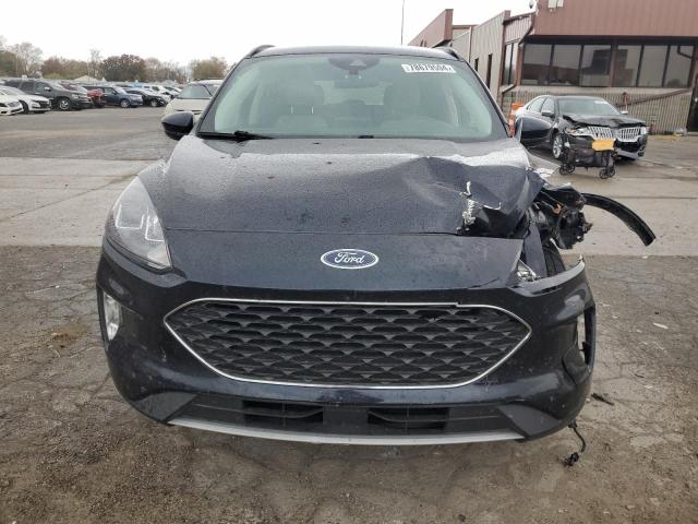 Photo 5 from auction – 2021 FORD ESCAPE SEL with VIN 1FMCU9CZ2MUA86082