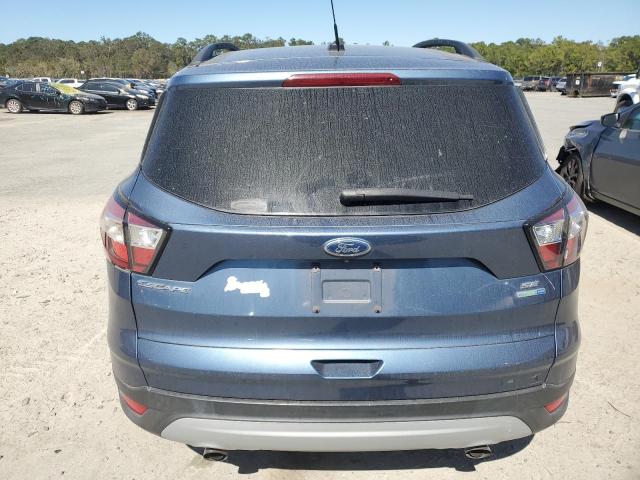 Photo 6 from auction – 2018 FORD ESCAPE SE with VIN 1FMCU9GD0JUC61715