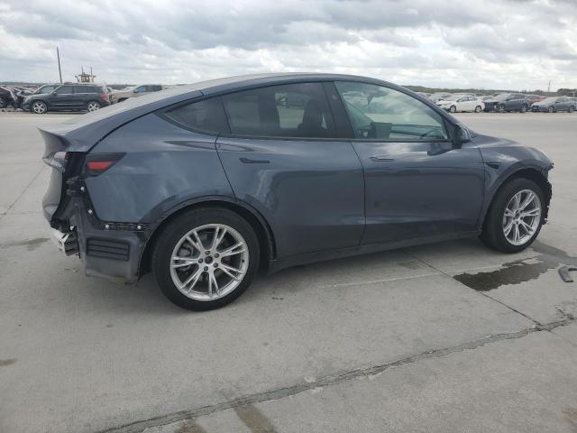 Photo 3 from auction – 2023 TESLA MODEL Y with VIN 7SAYGDED9PF965231