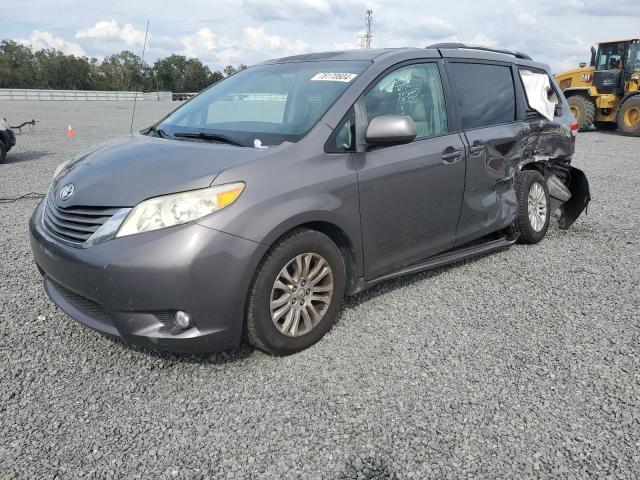 TOYOTA SIENNA XLE 2011 with VIN 5TDYK3DC7BS136676 - Photo from auction