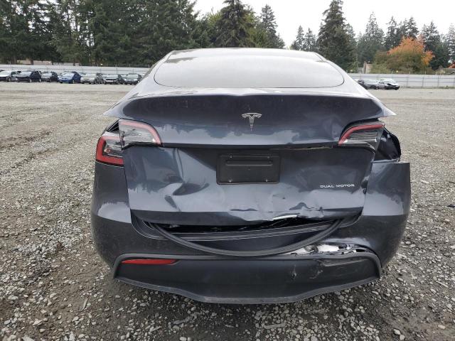 Снимка 6 от търг – 2022 TESLA MODEL Y с VIN 7SAYGAEE4NF569924