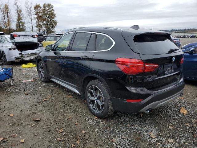Photo 2 from auction – 2018 BMW X1 XDRIVE2 with VIN WBXHT3C3XJ5F93281