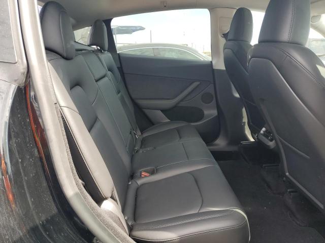 Photo 11 from auction – 2023 TESLA MODEL Y with VIN 7SAYGDEF9PF860478