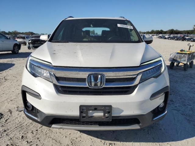 Photo 5 from auction – 2021 HONDA PILOT TOUR with VIN 5FNYF5H67MB006540