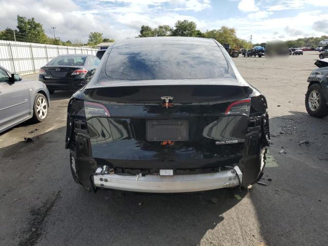 Photo 6 from auction – 2023 TESLA MODEL Y with VIN 7SAYGDEF8PF747377