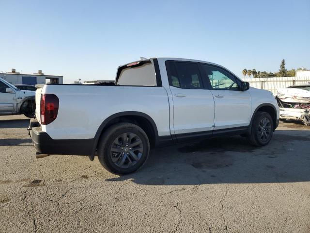 Photo 3 from auction – 2024 HONDA RIDGELINE with VIN 5FPYK3F19RB008859