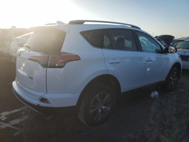 Photo 3 from auction – 2016 TOYOTA RAV4 XLE with VIN 2T3WFREV8GW269337