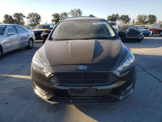 Photo 5 from auction – 2018 FORD FOCUS SE with VIN 1FADP3FE9JL313670