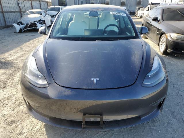 Photo 5 from auction – 2022 TESLA MODEL 3 with VIN 5YJ3E1EB9NF128356