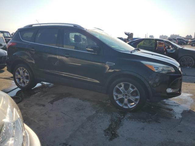 Photo 4 from auction – 2014 FORD ESCAPE TIT with VIN 1FMCU0J90EUB12355