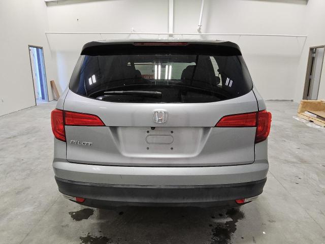 Photo 6 from auction – 2018 HONDA PILOT LX with VIN 5FNYF5H15JB033011