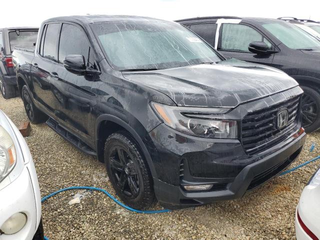 Photo 4 from auction – 2021 HONDA RIDGELINE with VIN 5FPYK3F89MB021715