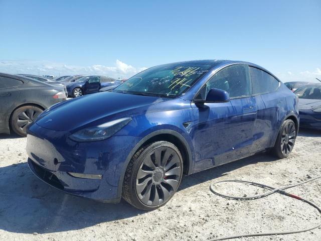 TESLA MODEL Y 2023 with VIN 7SAYGDEF9PF633369 - Photo from auction