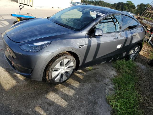 TESLA MODEL Y 2023 with VIN 7SAYGDEE6PA211127 - Photo from auction