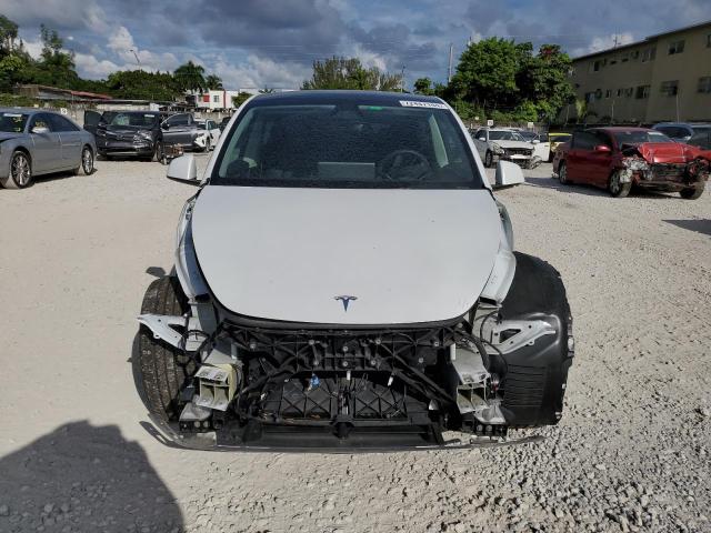 Photo 5 from auction – 2023 TESLA MODEL Y with VIN 7SAYGDEE6PA146540