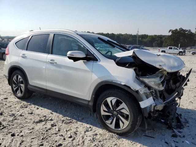 Photo 4 from auction – 2015 HONDA CR-V with VIN 5J6RM4H9XFL076848