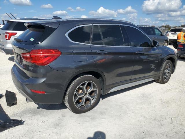 Photo 3 from auction – 2017 BMW X1 XDRIVE2 with VIN WBXHT3C3XH5F71873