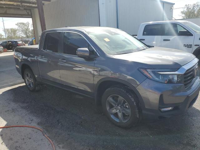 Photo 4 from auction – 2022 HONDA RIDGELINE with VIN 5FPYK3F54NB013058