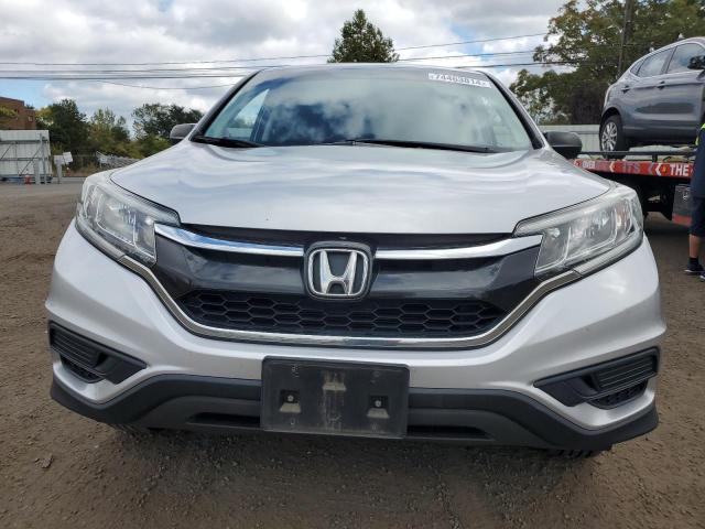 Photo 5 from auction – 2015 HONDA CR-V LX with VIN 2HKRM4H30FH694816