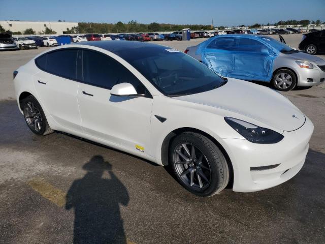 Photo 4 from auction – 2023 TESLA MODEL 3 with VIN 5YJ3E1EA7PF570806