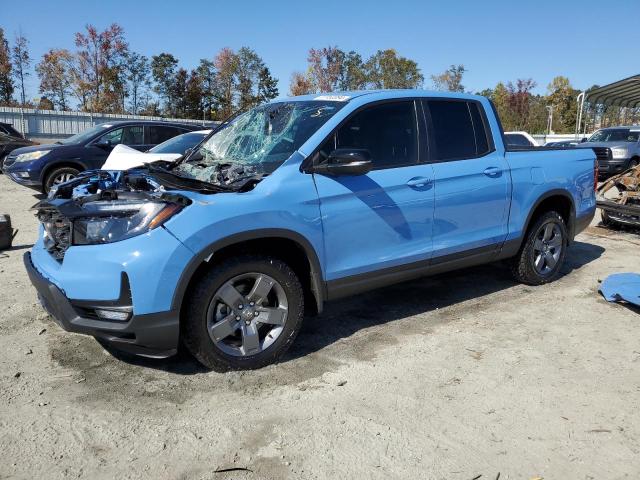Photo 1 from auction – 2024 HONDA RIDGELINE with VIN 5FPYK3F68RB019881