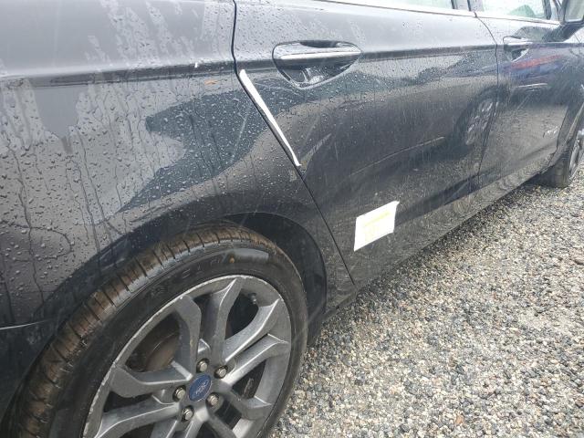 Photo 12 from auction – 2019 FORD FUSION TIT with VIN 3FA6P0RU2KR259562