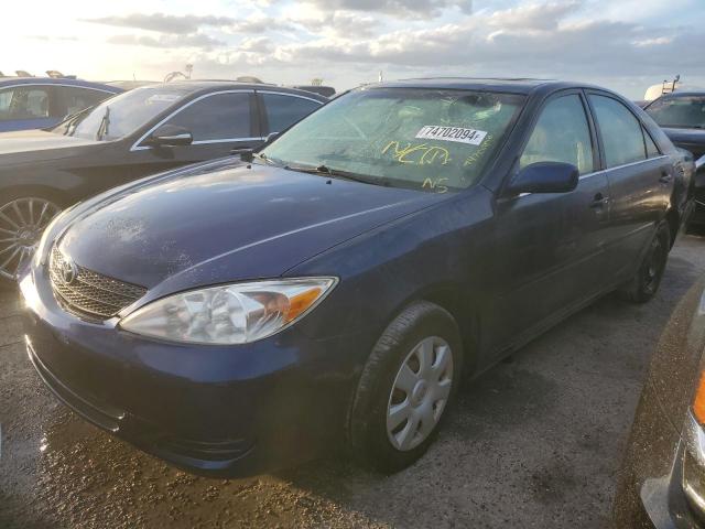 TOYOTA CAMRY LE 2002 with VIN JTDBE32K920027713 - Photo from auction