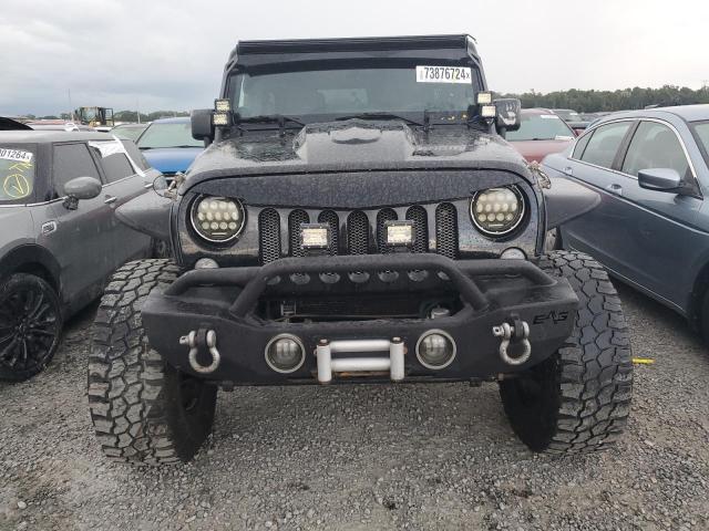 Photo 5 from auction – 2014 JEEP WRANGLER U with VIN 1C4BJWDGXEL231896