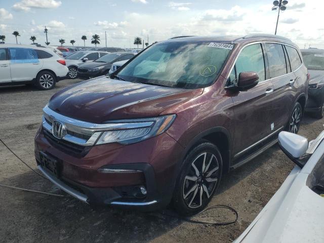 HONDA PILOT TOUR 2022 with VIN 5FNYF6H67NB081228 - Photo from auction
