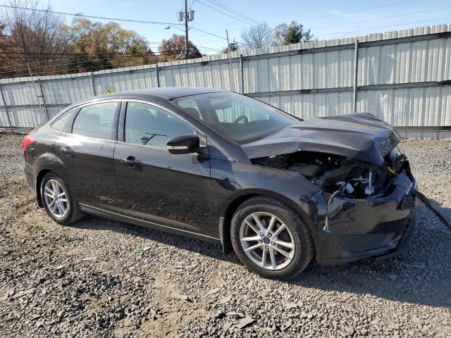 Photo 4 from auction – 2016 FORD FOCUS SE with VIN 1FADP3F26GL248615