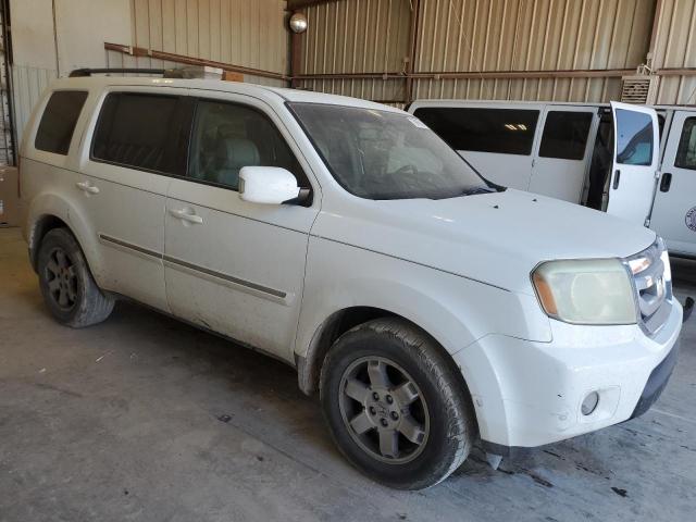 Photo 4 from auction – 2010 HONDA PILOT TOUR with VIN 5FNYF3H8XAB019977