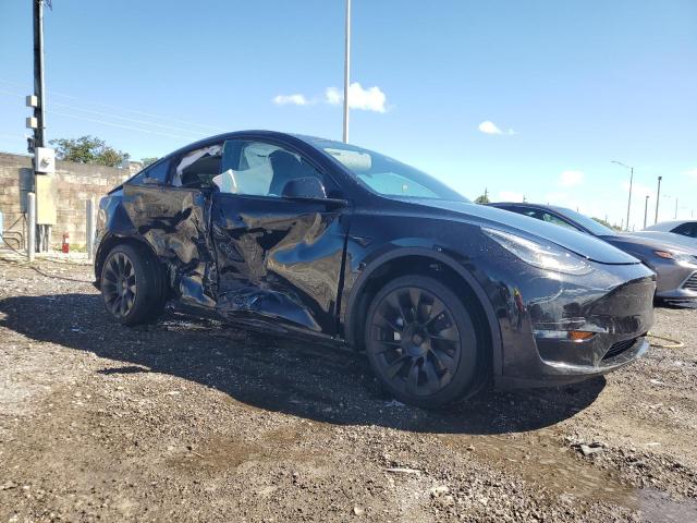 Photo 4 from auction – 2022 TESLA MODEL Y with VIN 7SAYGDEE1NF480796