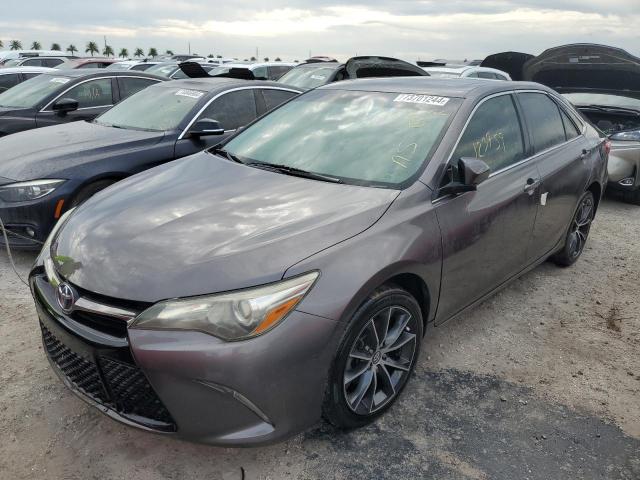 TOYOTA CAMRY LE 2016 with VIN 4T1BF1FK9GU204459 - Photo from auction