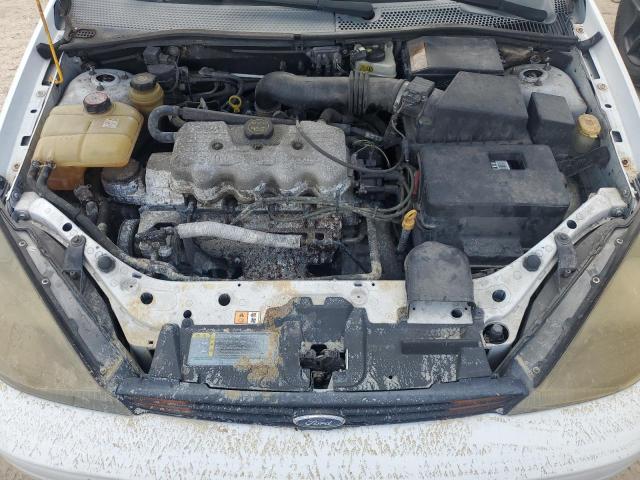 Photo 11 from auction – 2003 FORD FOCUS LX with VIN 1FAFP33P73W223532