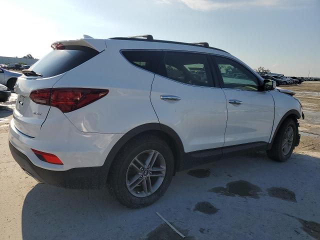 Photo 3 from auction – 2018 HYUNDAI SANTA FE S with VIN 5NMZU3LB0JH083554