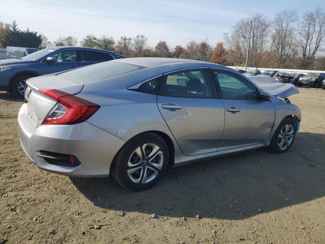 Photo 3 from auction – 2017 HONDA CIVIC LX with VIN 2HGFC2F51HH553281