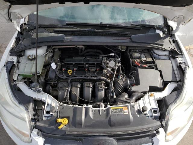 Foto 11 de la subasta – 2014 FORD FOCUS SE con VIN 1FADP3F26EL224411